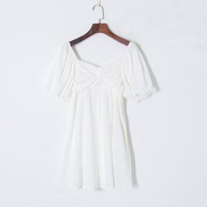 A dress with a high waist makes it slimmer